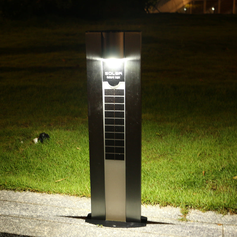 EV-GL-116 solar bollard lit at night beside a lawn path