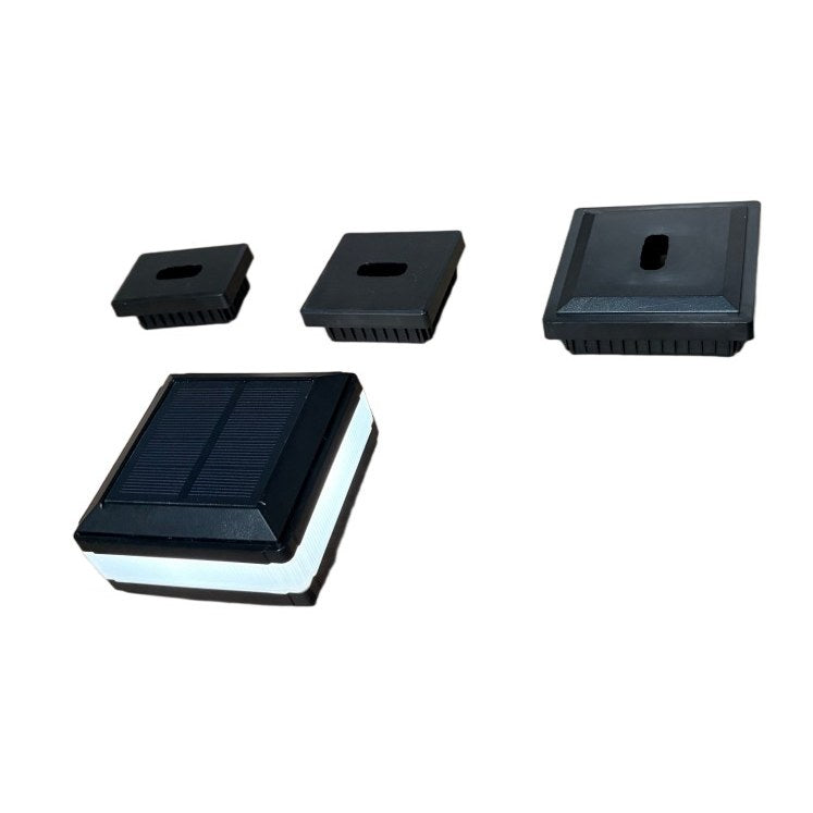 RGB Colour-Changing solar garden light staked in a garden bed at night