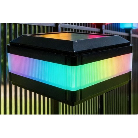 RGB Colour-Changing solar garden light staked in a garden bed at night