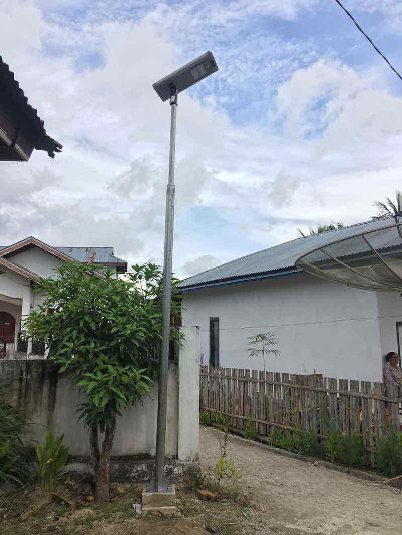 EV-SL-120 pole-mounted on a village street