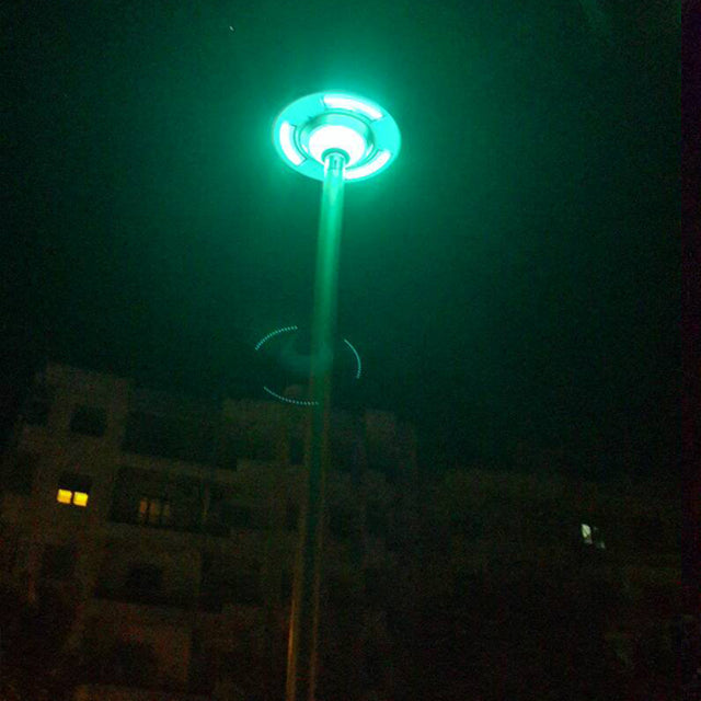 EV-PZ-105 landscape light glowing green at night