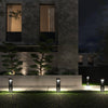 Row of EV-GL-116 solar bollards lighting a house front at night