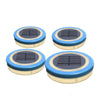 Mini floating solar pool light glowing warm white on water at night