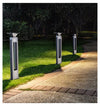EV-GL-117 solar bollards along a garden path at dusk
