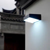 EVIEKO EV-WL-105 solar motion wall light on a stone wall