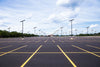 Solar parking lot lights installed across a large car park