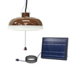 Wood-grain solar pendant light hanging in a gazebo with external solar panel