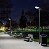 EV-PZ-102 oval solar post-top lights along a park walkway at night