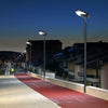 EV-PZ-102 oval solar lights along a riverside promenade at dusk