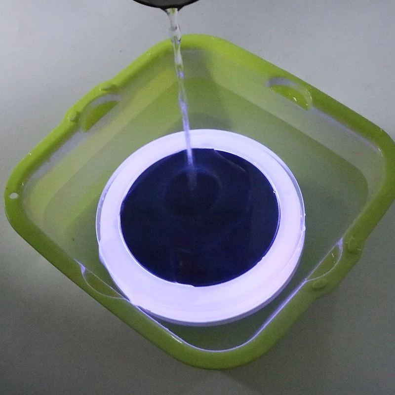 EVIEKO solar pool light lit in water