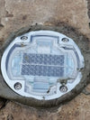 EVIEKO heavy-duty solar road stud installed in pavement