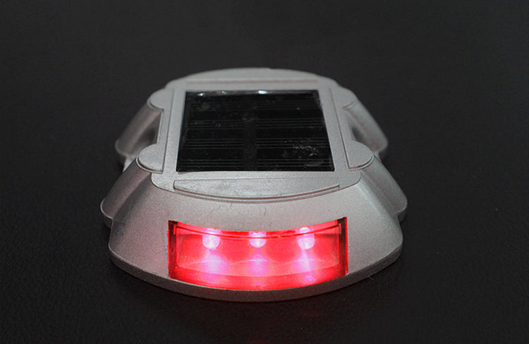 EVIEKO horseshoe solar road stud flashing red at night