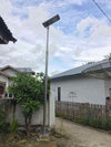 EV-SL-120 pole-mounted on a village street