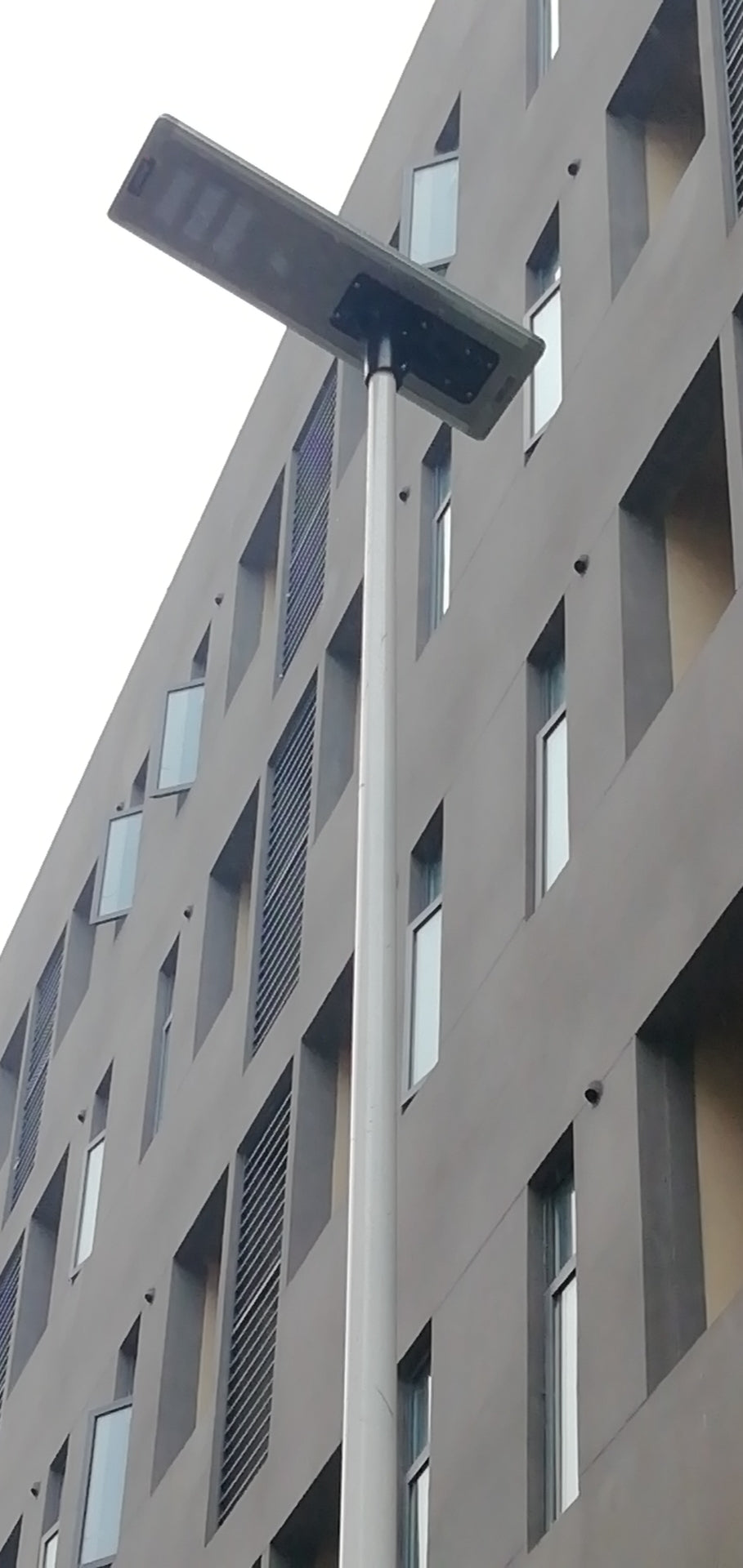 EV-SL-121 installed beside an apartment building