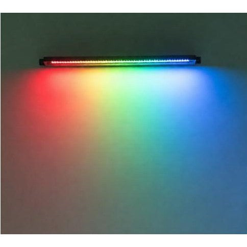 900mm RGB solar wall wash light casting coloured light up a wall