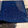 Solar charging coffee table with built-in panel on a patio