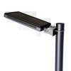 Solar courtyard light head on a short pole lighting a garden path