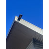 Solar courtyard street light head mounted on a short garden pole
