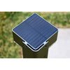 Slim aluminium solar garden bollard light beside a path