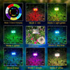 Jellyfish-shaped colour-changing solar garden light on a lawn
