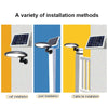 Rotatable solar wall light with separate solar panel on a cable