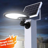 Rotatable solar wall light with separate solar panel on a cable