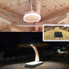 Solar pendant light with remote control hanging under a terrace roof