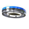 Mini floating solar pool light glowing warm white on water at night