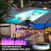 RGBW floating solar pool light changing colours in a swimming pool