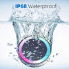 RGBW floating solar pool light changing colours in a swimming pool