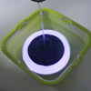 RGBW floating solar pool light changing colours in a swimming pool