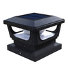 Solar post cap light on a timber fence post
