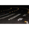 Heavy-duty die-cast aluminium solar road stud on a highway lane line
