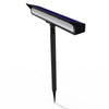 Compact solar sign light illuminating a house number plaque