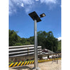 60W all-in-one solar street light with 100W solar panel on a pole