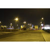 100W all-in-one solar street light with 160W solar panel on a pole