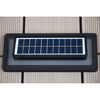 Aluminium solar wall light casting steady white light on an exterior wall
