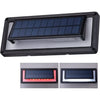 Aluminium solar wall light with sound sensor glowing blue on a wall